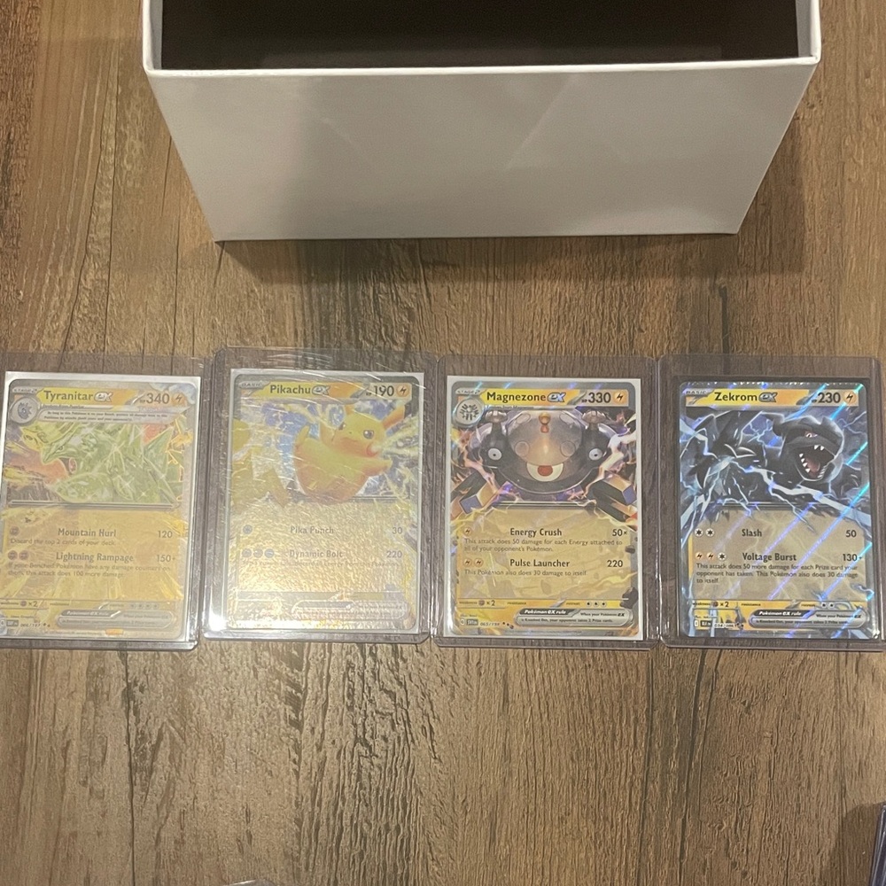 Pokemon Card Set with tyranitar ex, Pikachu ex, magnezone ex, Zekrom ex.